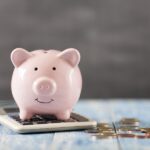 piggy bank on calculator, maximize your dental insurance benefits in Indian Trail, NC