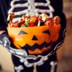 bowl of halloween candy for halloween dental myths
