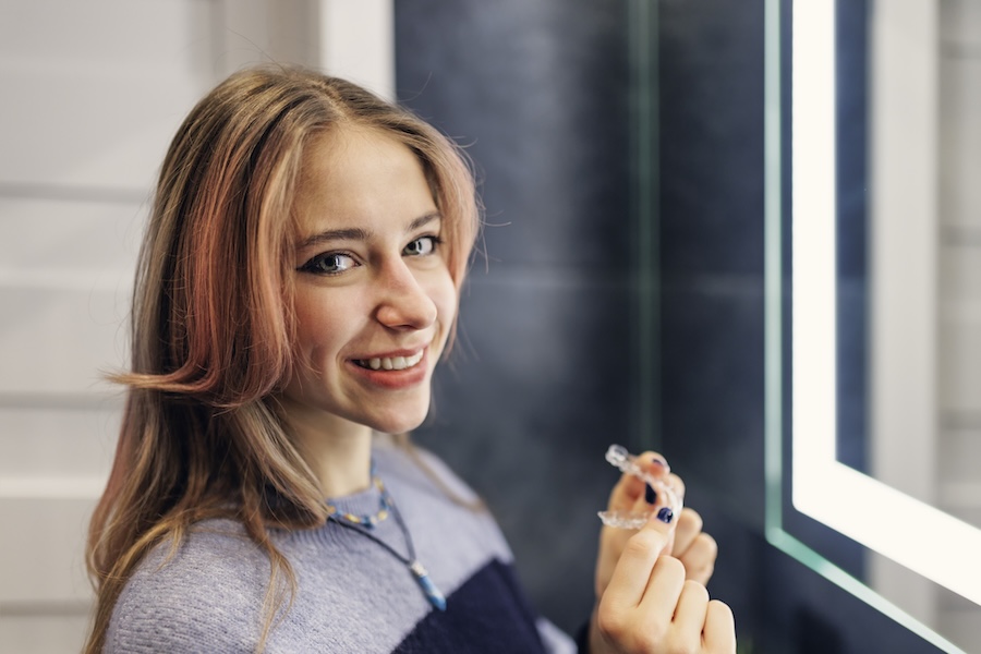 teen girl with invisalign